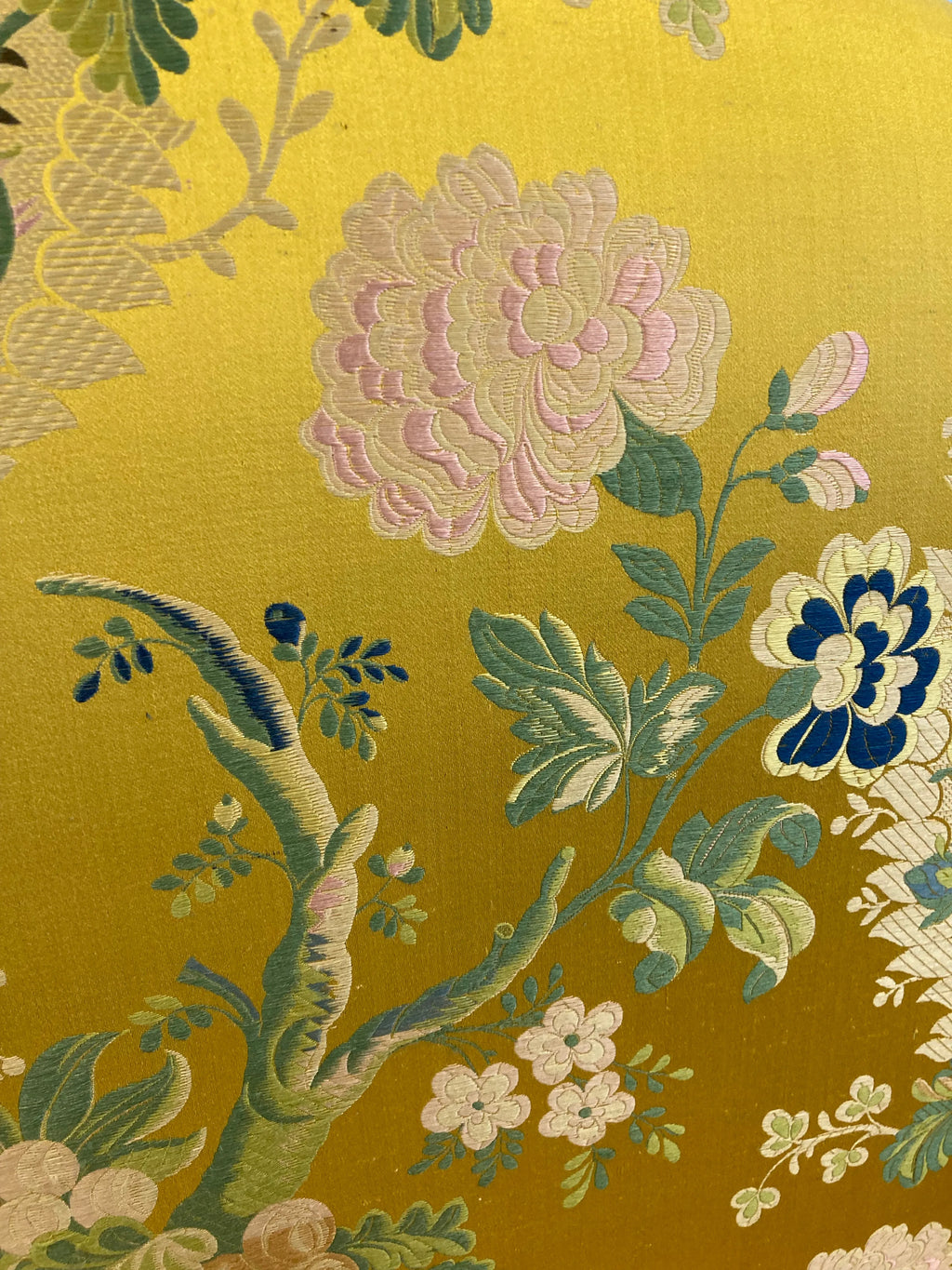 Early 20th Century Chippendale Camelback Scroll Arm Settee in Golden and Pink Famille Rose Chinoiserie Silk Brocade