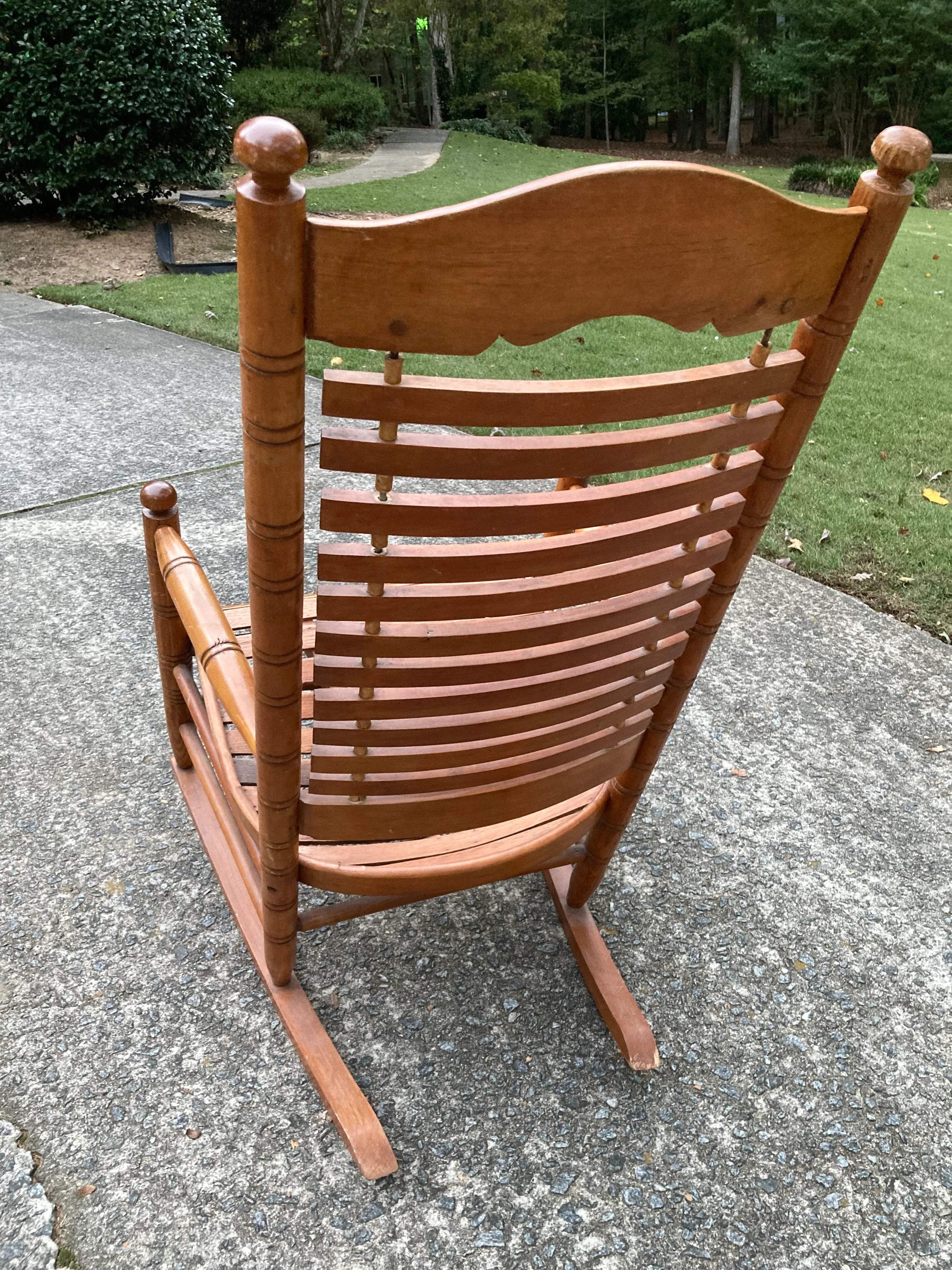 Early 20th Century Rare Form Oak Rocking Chair With Floating Slat Back and Seat