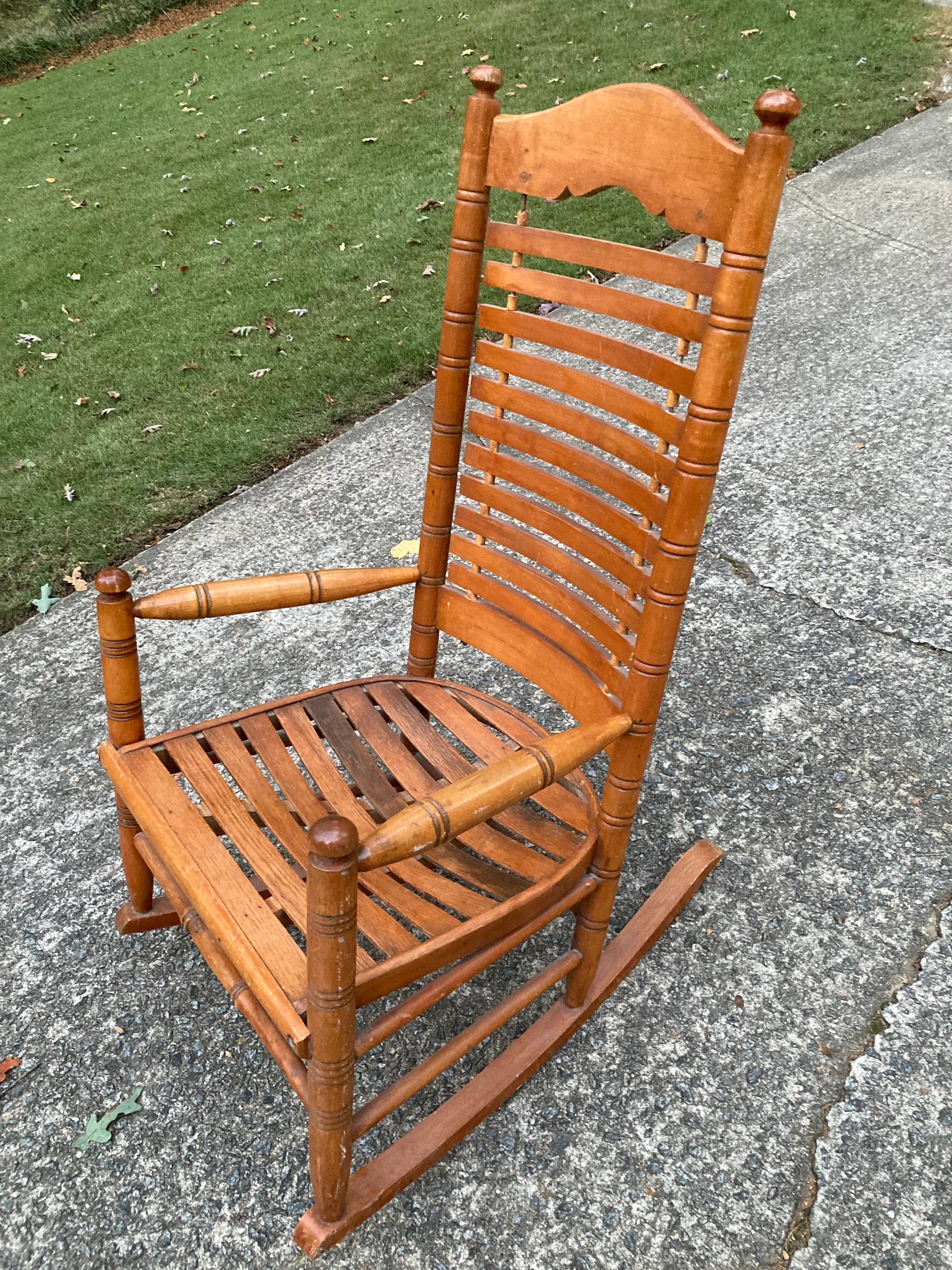 Early 20th Century Rare Form Oak Rocking Chair With Floating Slat Back and Seat