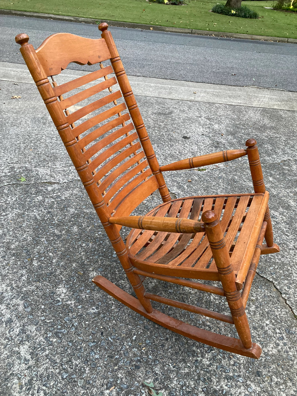 Early 20th Century Rare Form Oak Rocking Chair With Floating Slat Back and Seat