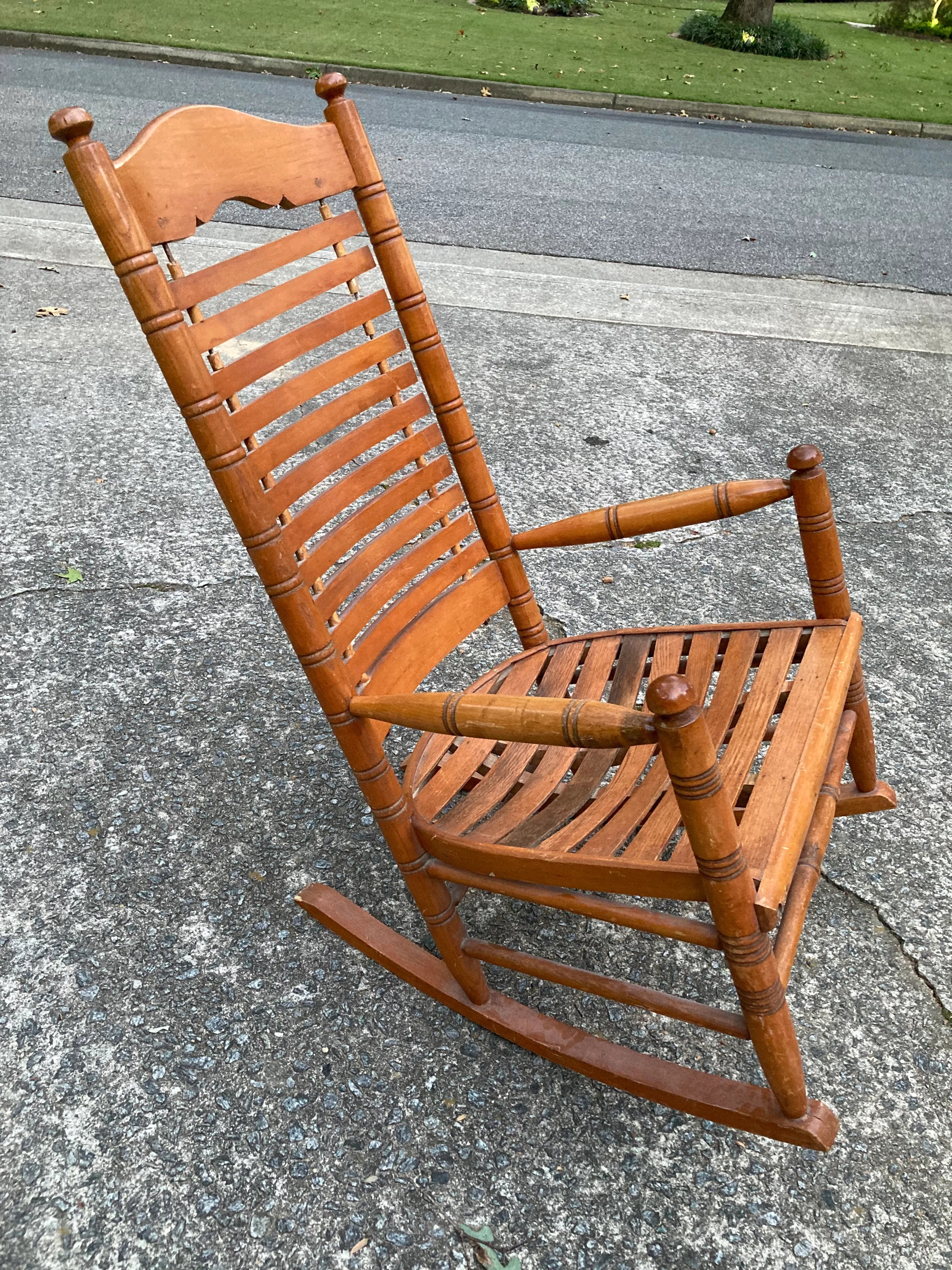 Early 20th Century Rare Form Oak Rocking Chair With Floating Slat Back and Seat