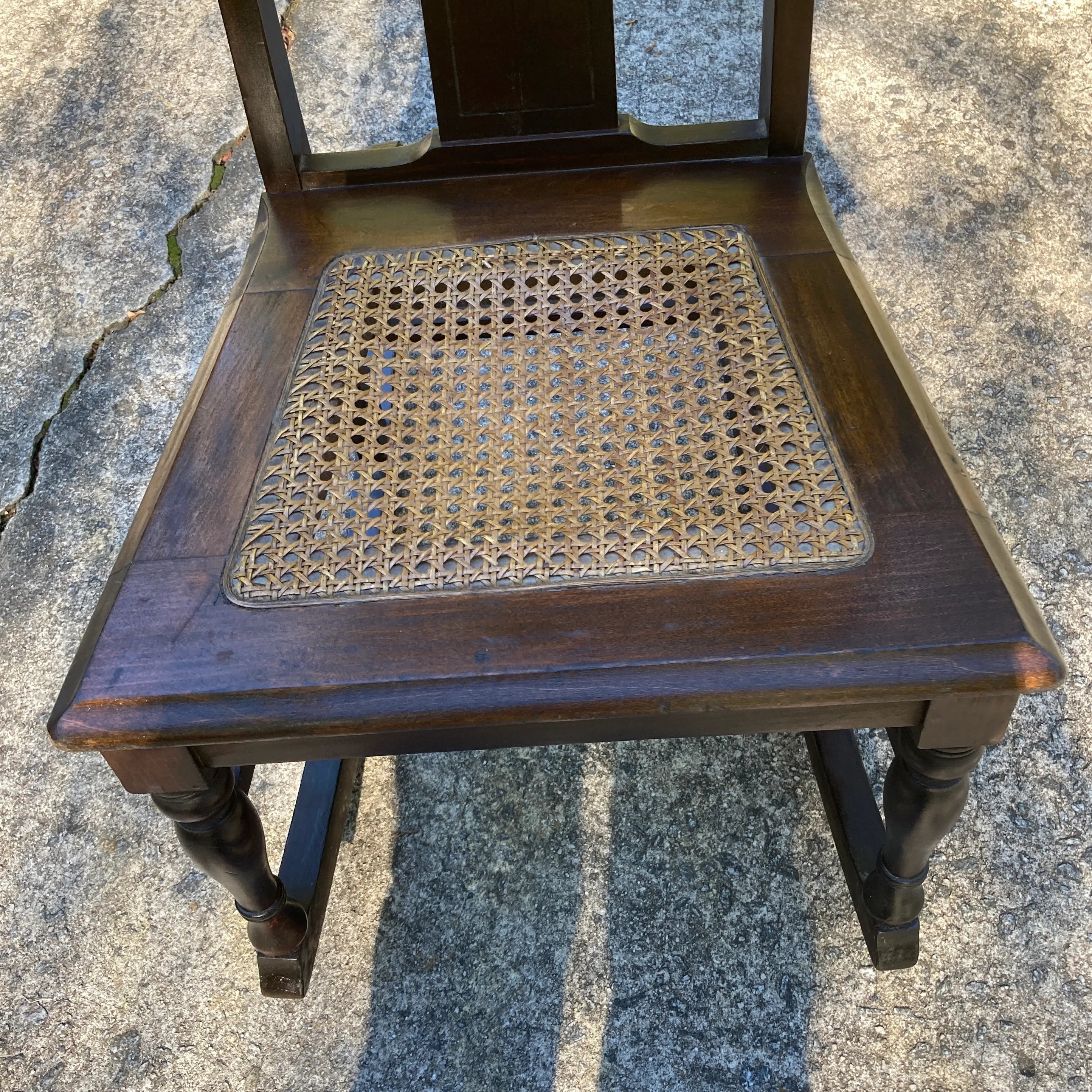 Late 19th Century Antique Armless Child’s Rocking Chair With Caned Seat