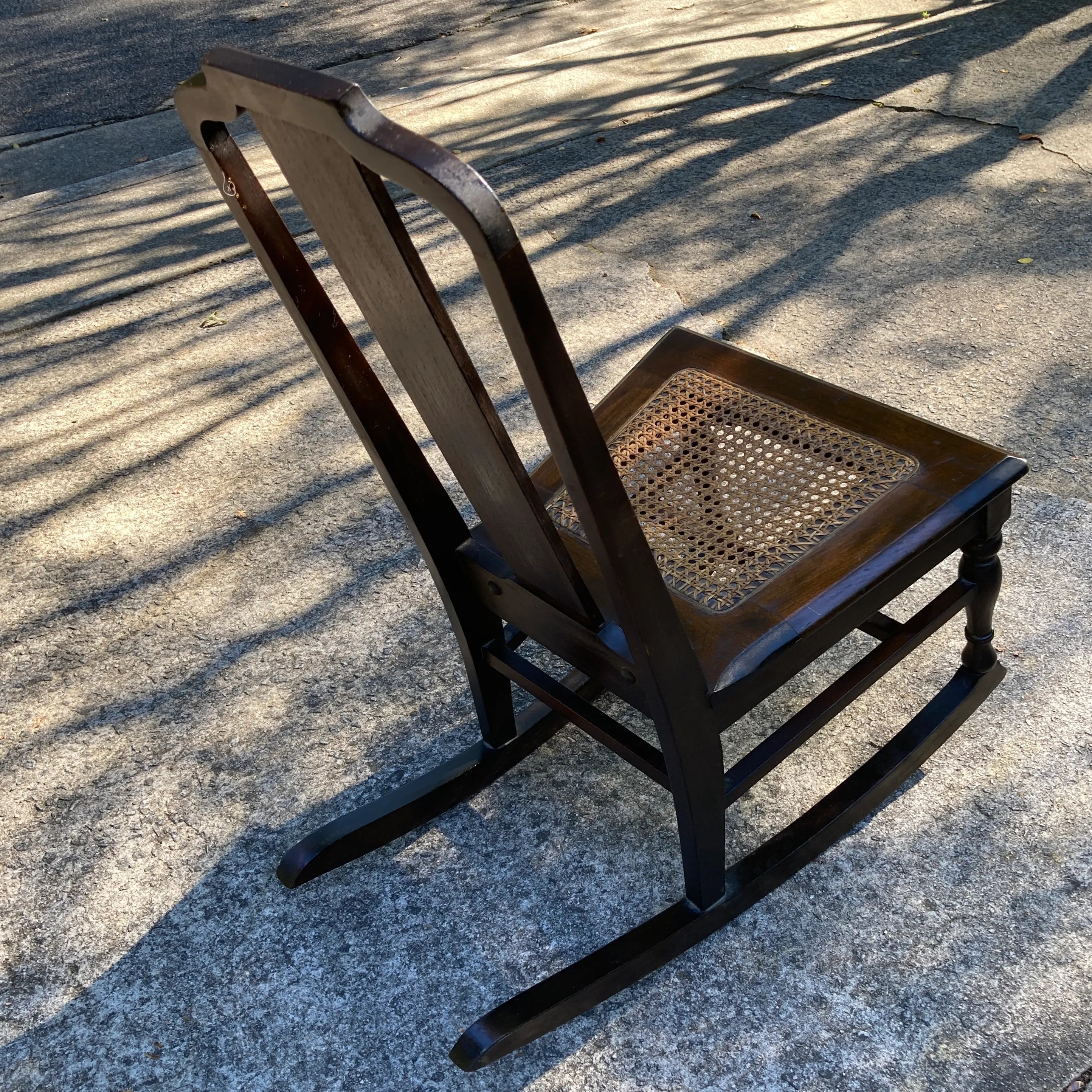 Late 19th Century Antique Armless Child’s Rocking Chair With Caned Seat