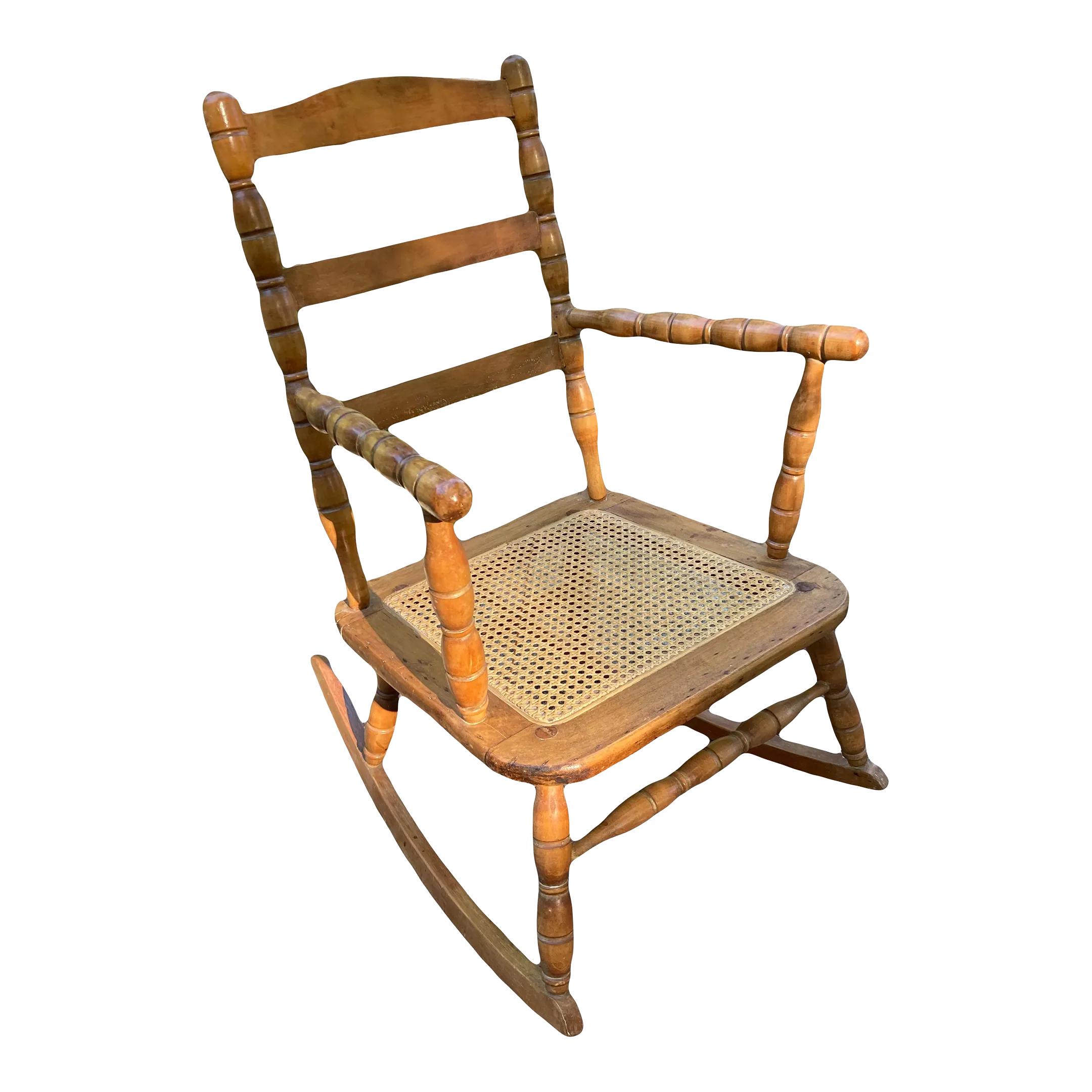 Late 19th Century Antique Turned Wood Ladder Back Open Arm Rocking Chair With Caned Seat