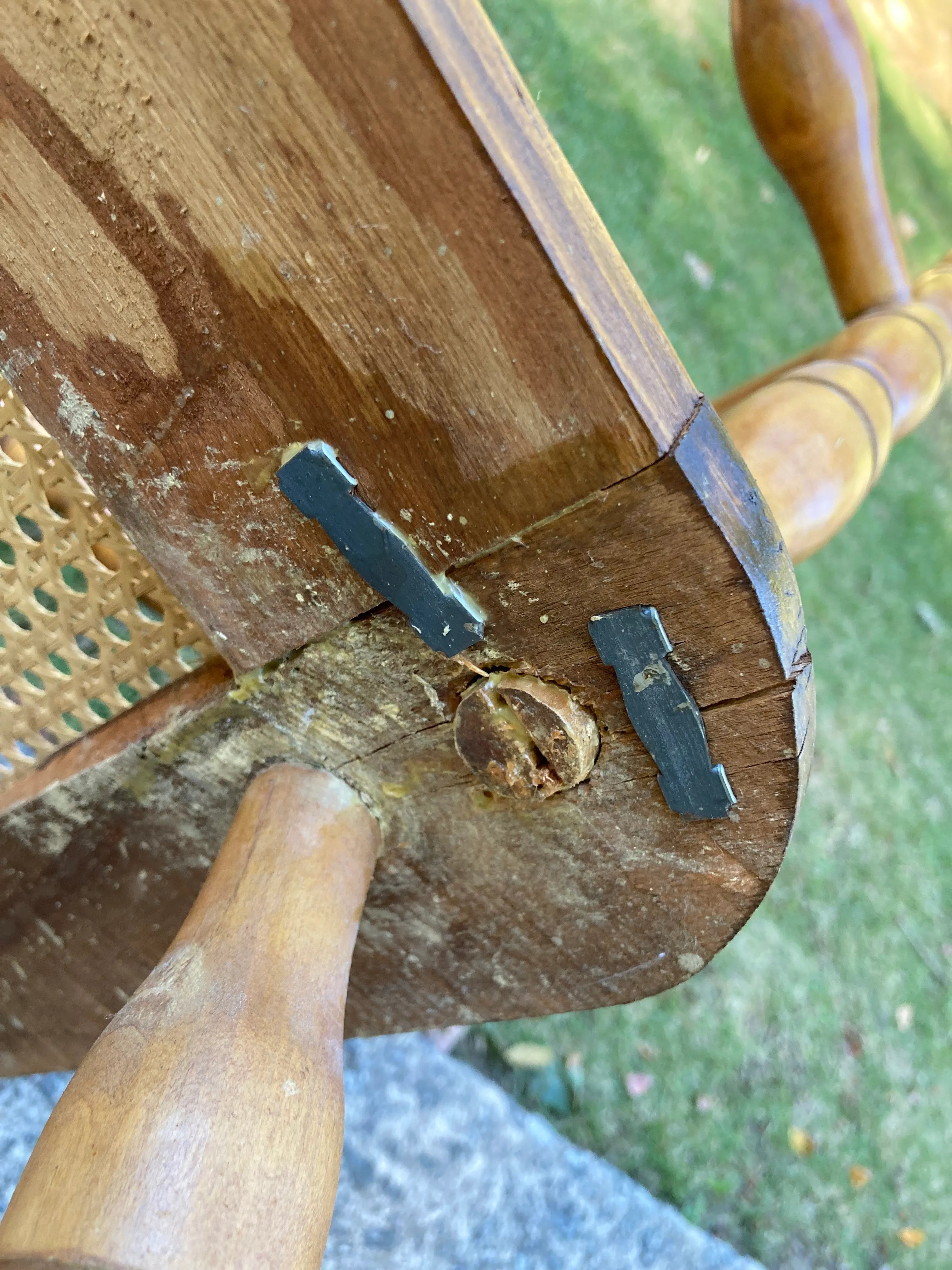 Late 19th Century Antique Turned Wood Ladder Back Open Arm Rocking Chair With Caned Seat