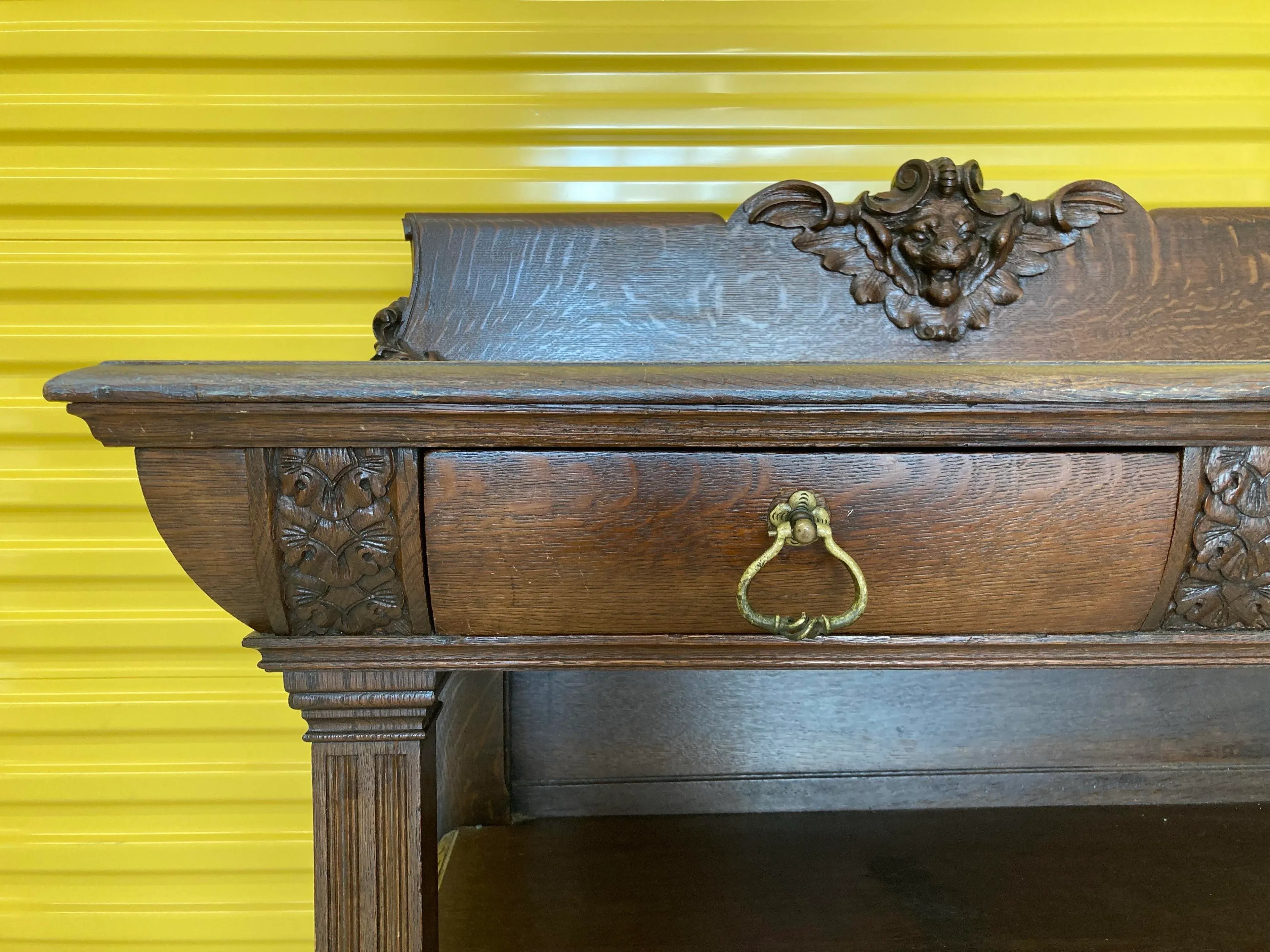 Late 19th Century Gothic Revival Side Board Buffet With Carved Lion Head Cornice