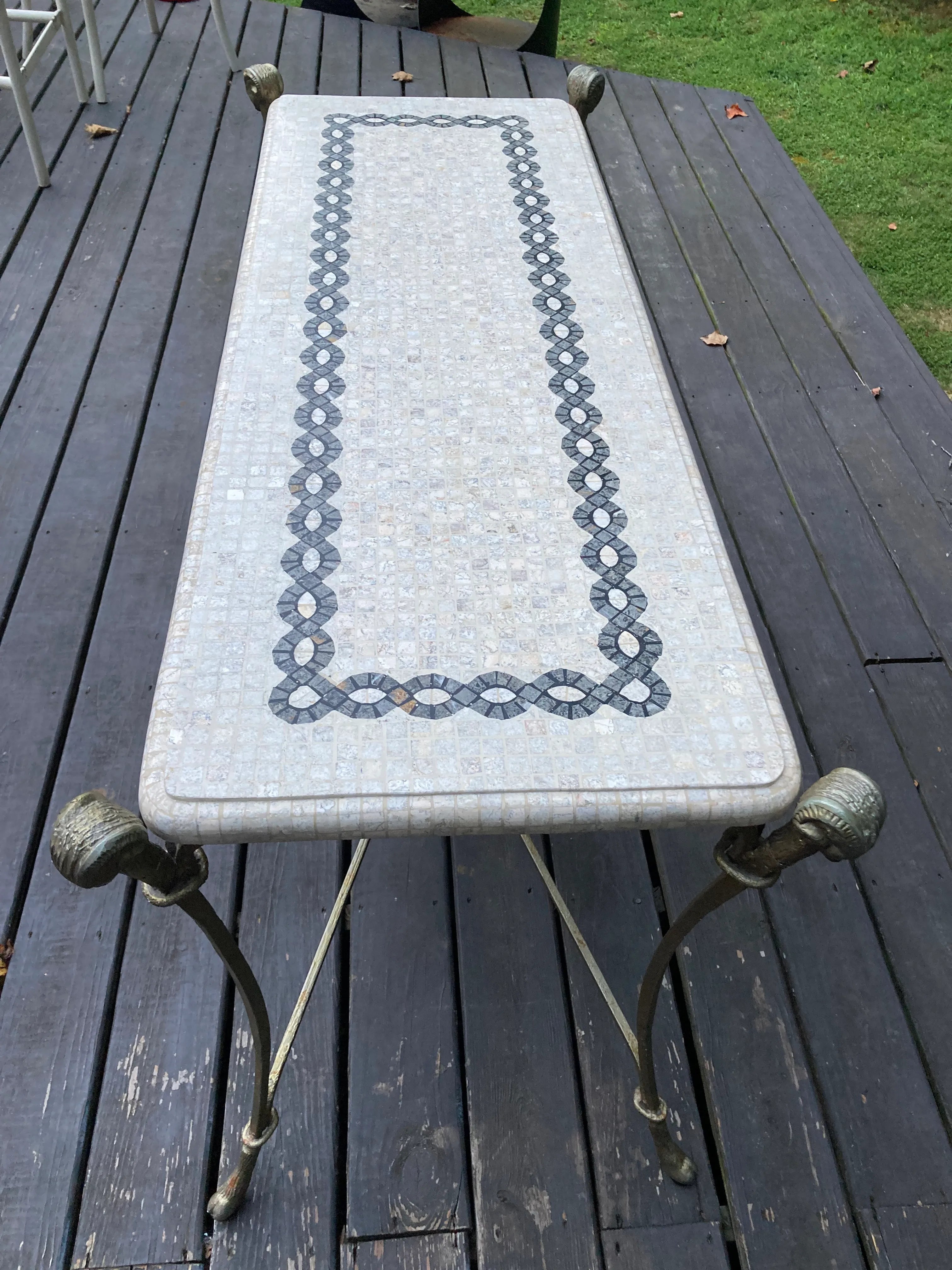 Late 20th Century Neoclassical Iron and Tessellated Stone Ram’s Head Console Table Attributed to Maitland Smith