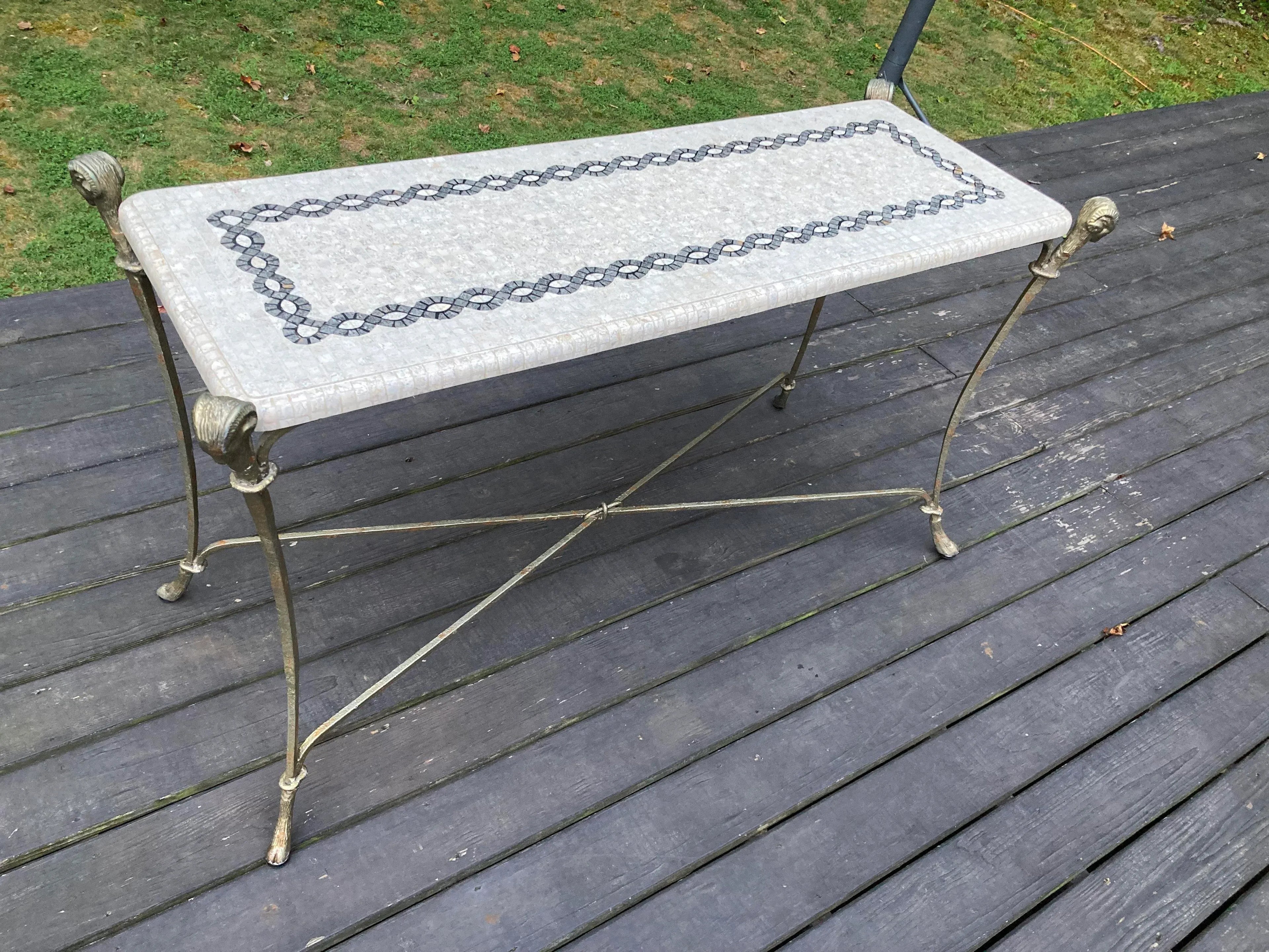 Late 20th Century Neoclassical Iron and Tessellated Stone Ram’s Head Console Table Attributed to Maitland Smith