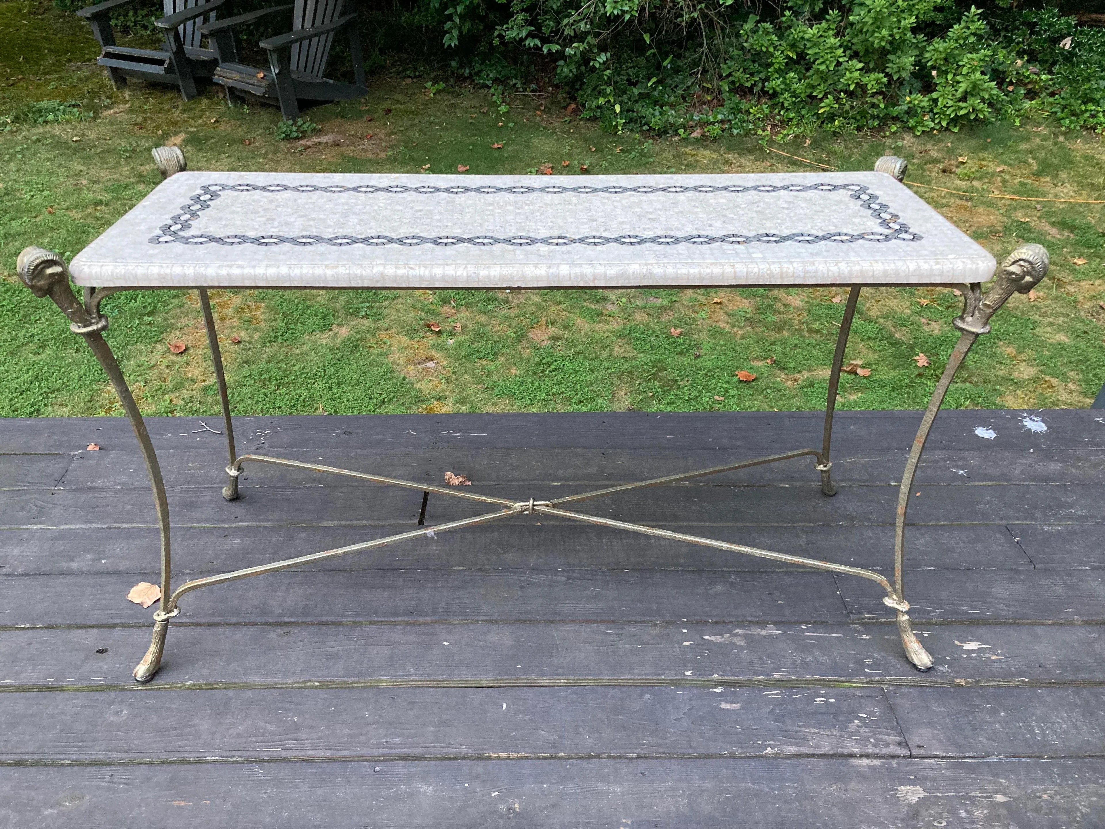 Late 20th Century Neoclassical Iron and Tessellated Stone Ram’s Head Console Table Attributed to Maitland Smith