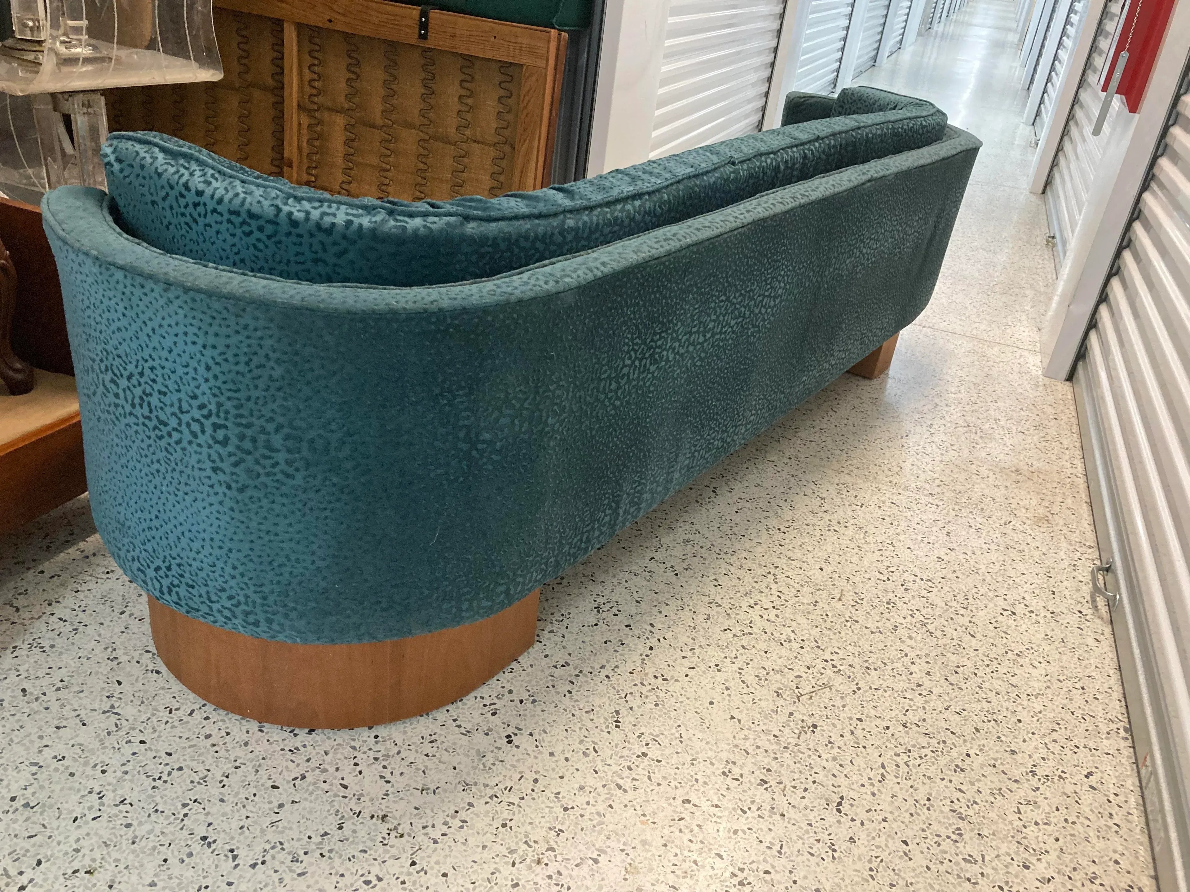 Mid-20th Century Art Deco or Danish Modern Style Elongated Curved Sofa on Open Plinths