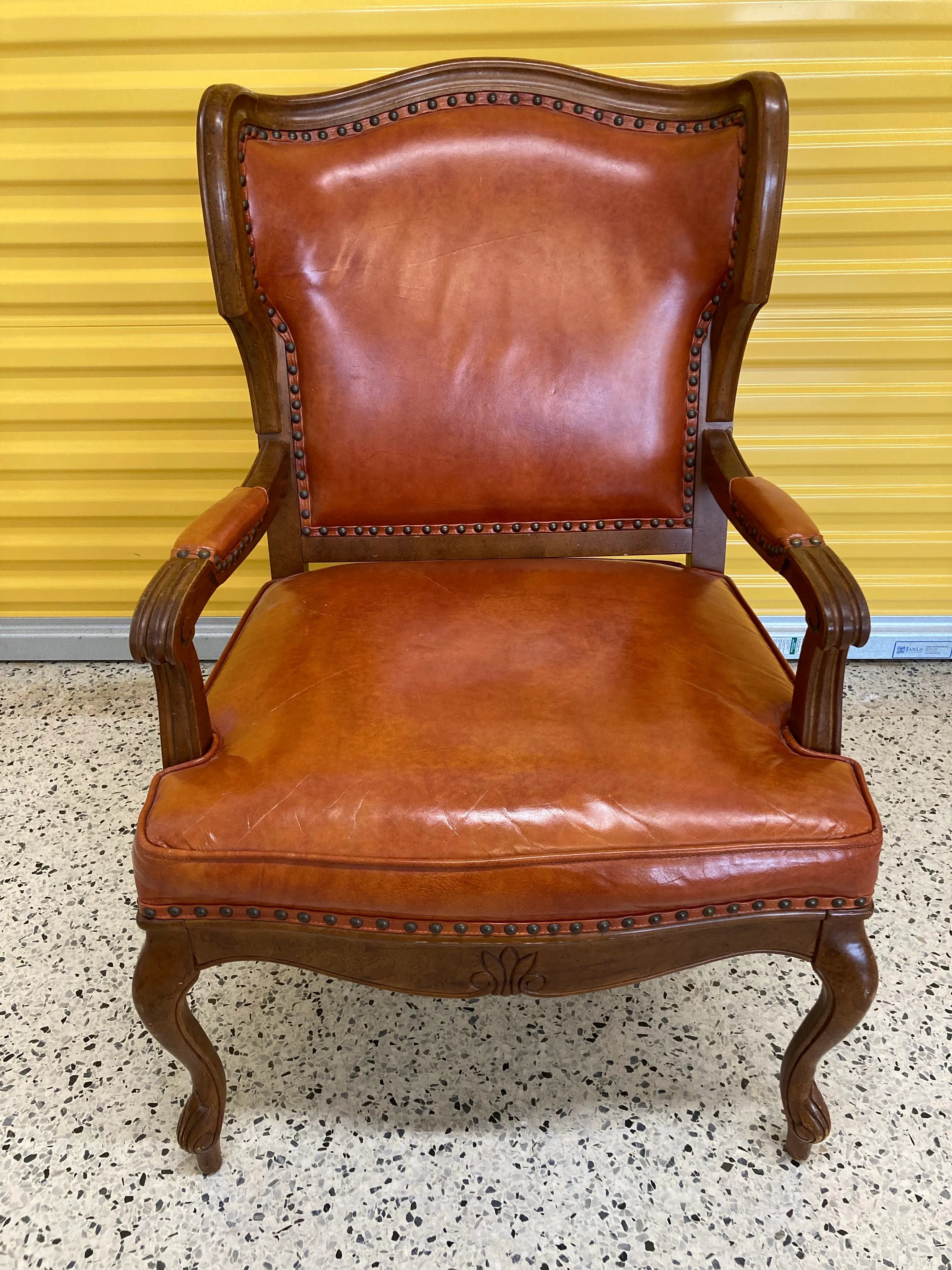 Mid-20th Century Library Armchair in Burnt Orange Leather With Nail Head Accents by Statesville Chair Company