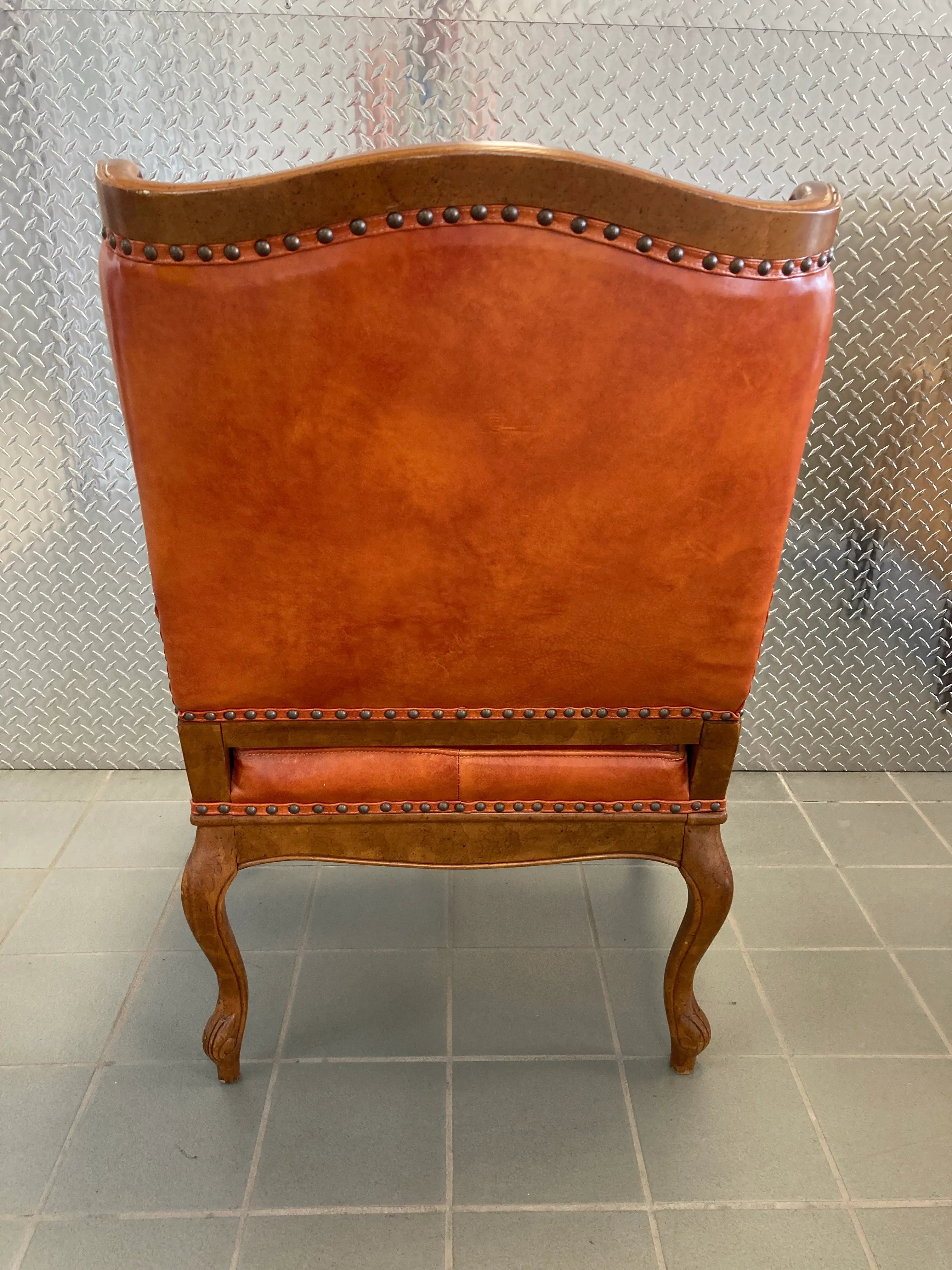 Mid-20th Century Library Armchair in Burnt Orange Leather With Nail Head Accents by Statesville Chair Company