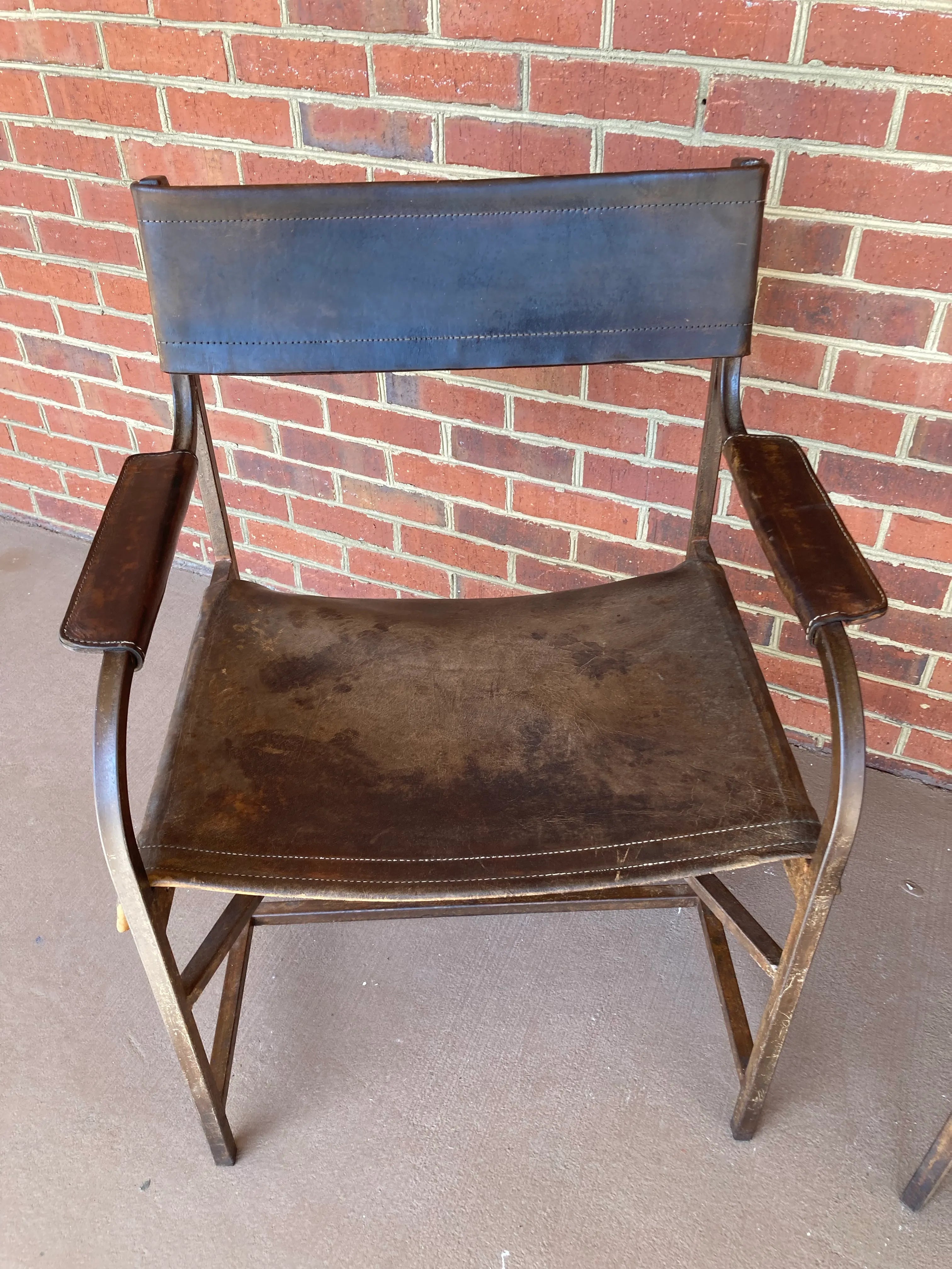 Naturally Distressed Low Profile Industrial Era Safari Armchairs in Curved Steel Frames and Riveted Leather After Marcel Breuer - Set of 2