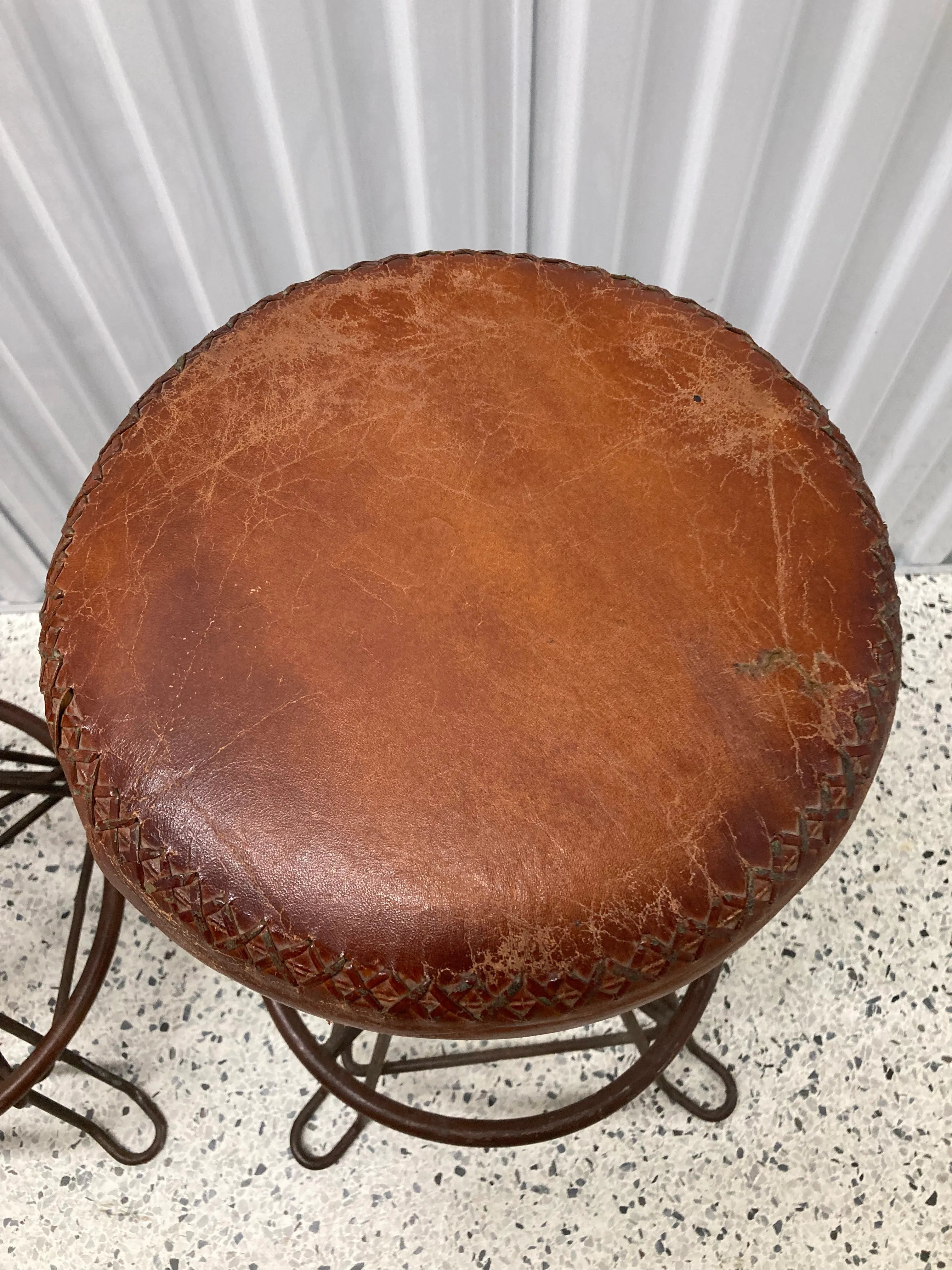 Vintage Mid-20th Century Distressed Leather and Iron Industrial Barstools - a Pair